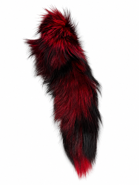 A long, fluffy fox fur accessory with a color-blocked pattern of deep red and black, shown against a plain white background.