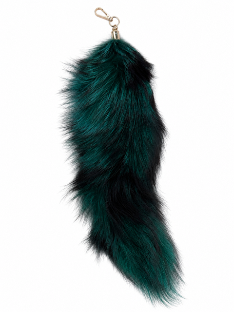 A long, fluffy fox-fur keychain or bag charm in a dark teal green color with black tips, finished with a gold-tone lobster clasp at the top, shown against a plain white background.